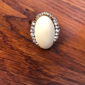 Cream color gold ring with diamonds
